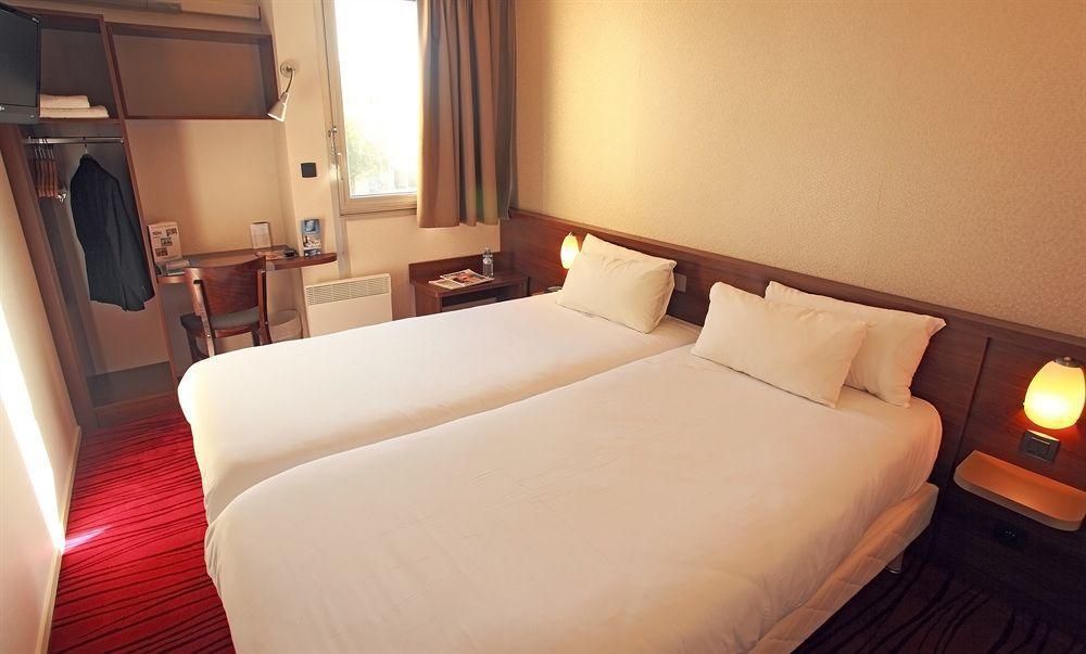 Brit Hotel Toulouse Colomiers - L'Esplanade Rom bilde